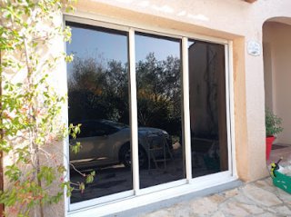 fim anti uv pose var sur baie vitrée coulissante